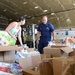 Coast Guardsmen deliver donated food, water and other aid to orphanage in Isabela, Puerto Rico