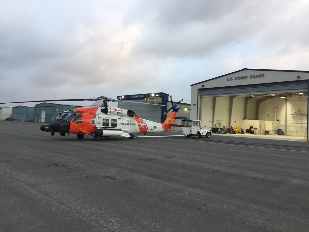 A Coast Guard Air Station Kodiak MH-60 Jayhawk sits in Cold Bay hangar