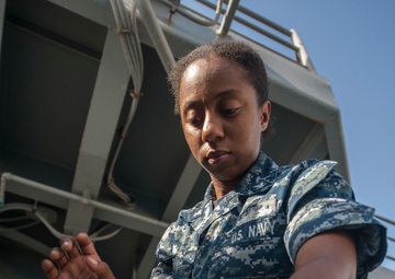 USS America Sailor adjust MK-38