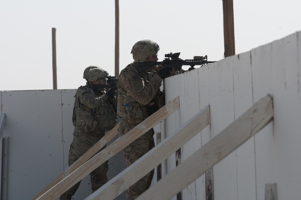 First Cavalry Division Soldiers pull security during joint forces training