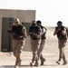 Kuwait Soldiers clear mock village with U.S. Soldiers
