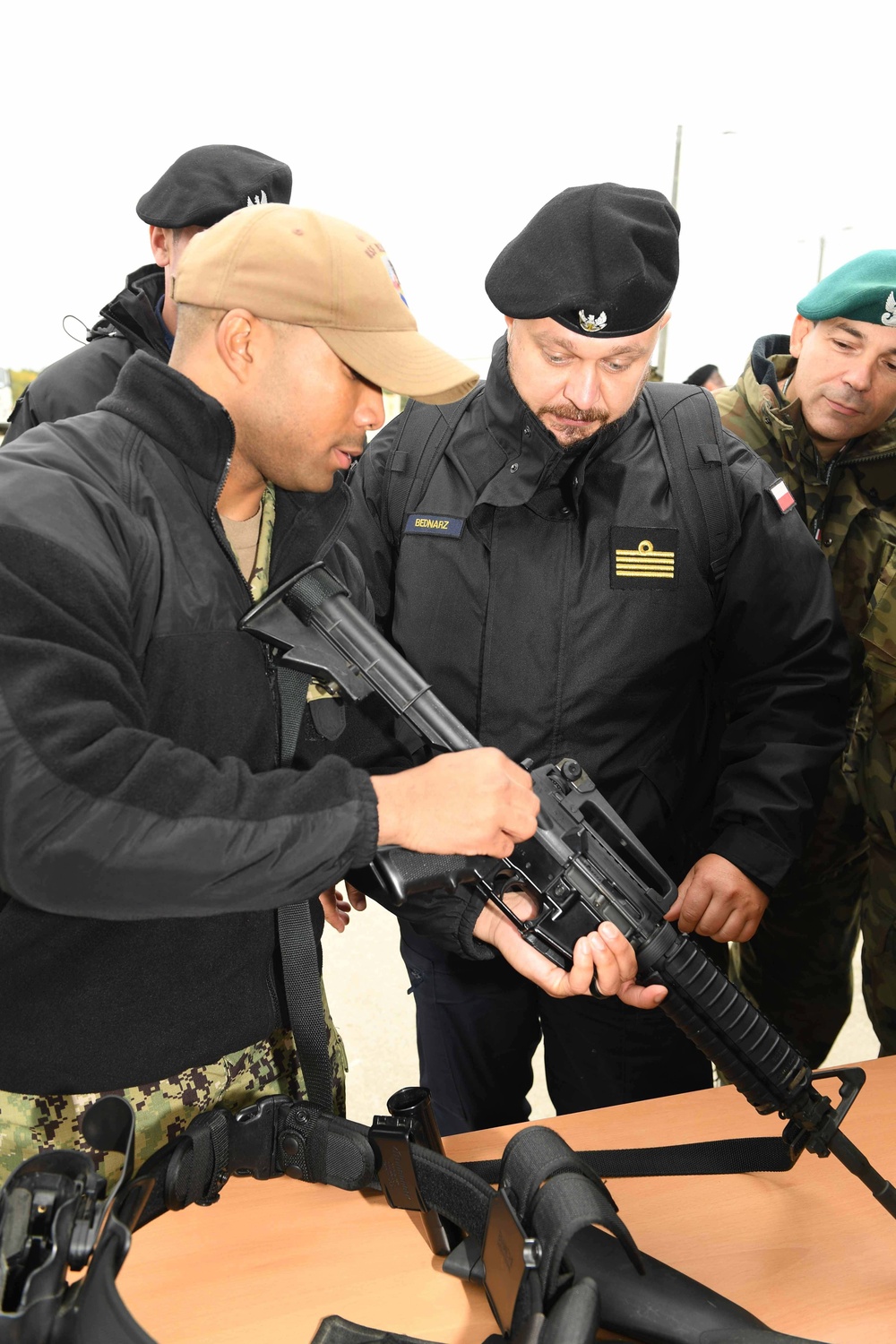 NSF Redzikowo Sailors show members of the Polish military a static weapons display