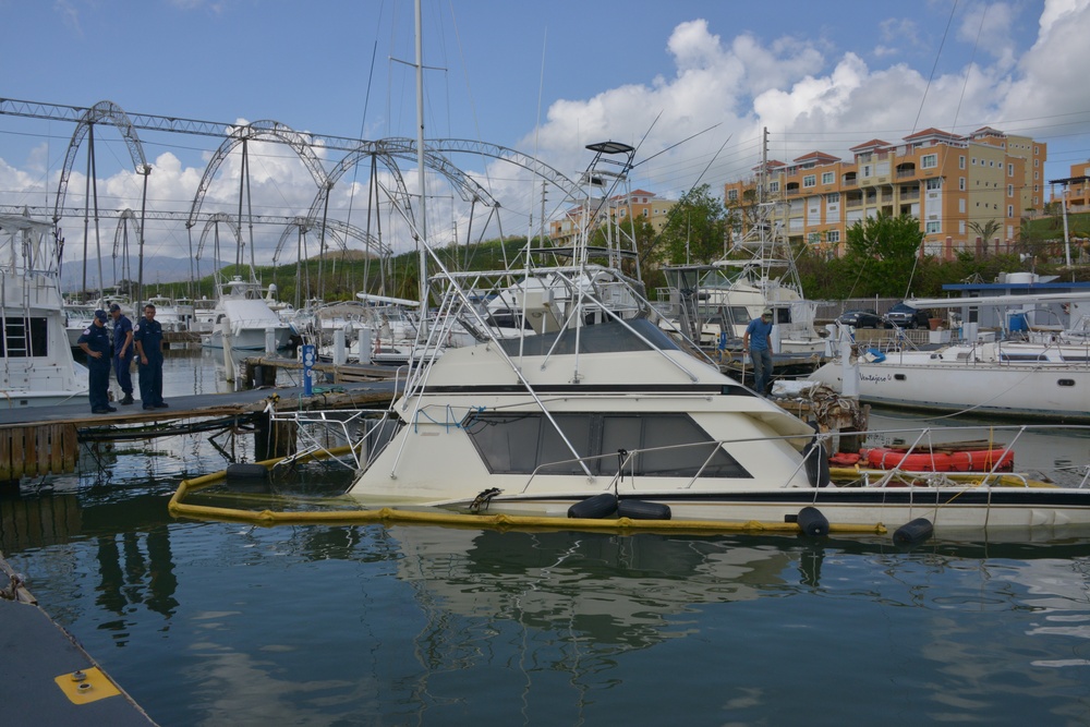 Maria ESF-10 PR Unified Command responders remove damaged vessels from the waters of Puerto Rico