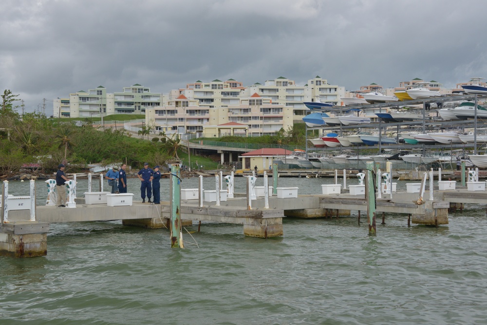Maria ESF-10 PR Unified Command responders remove damaged vessels from the waters of Puerto Rico