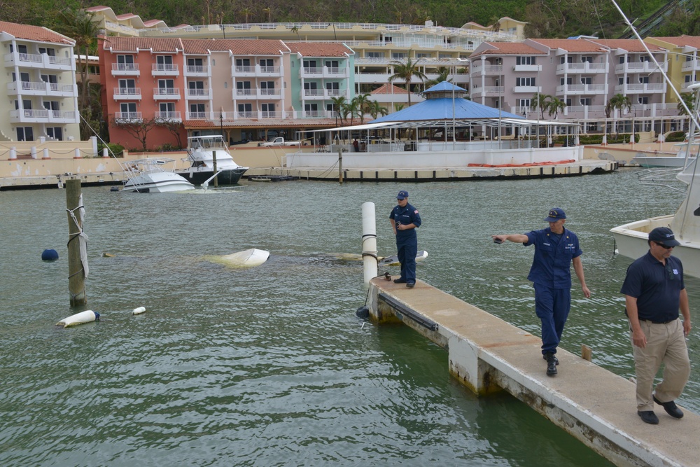 Maria ESF-10 PR Unified Command responders remove damaged vessels from the waters of Puerto Rico