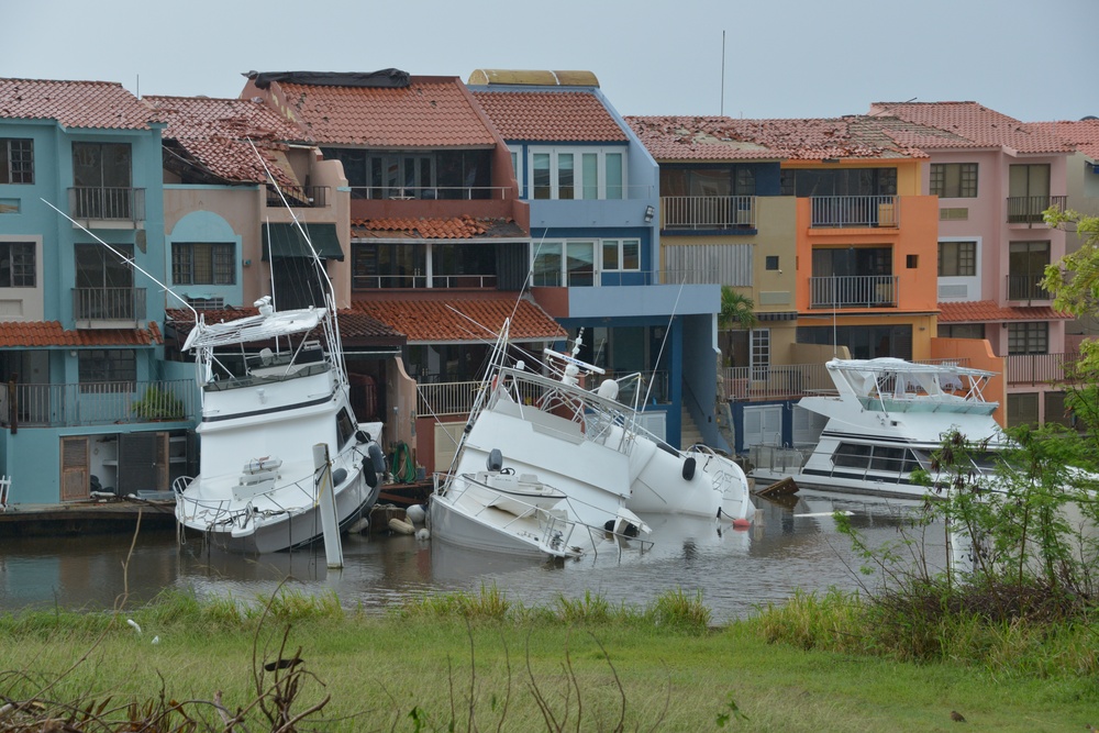 Maria ESF-10 PR Unified Command responders remove damaged vessels from the waters of Puerto Rico