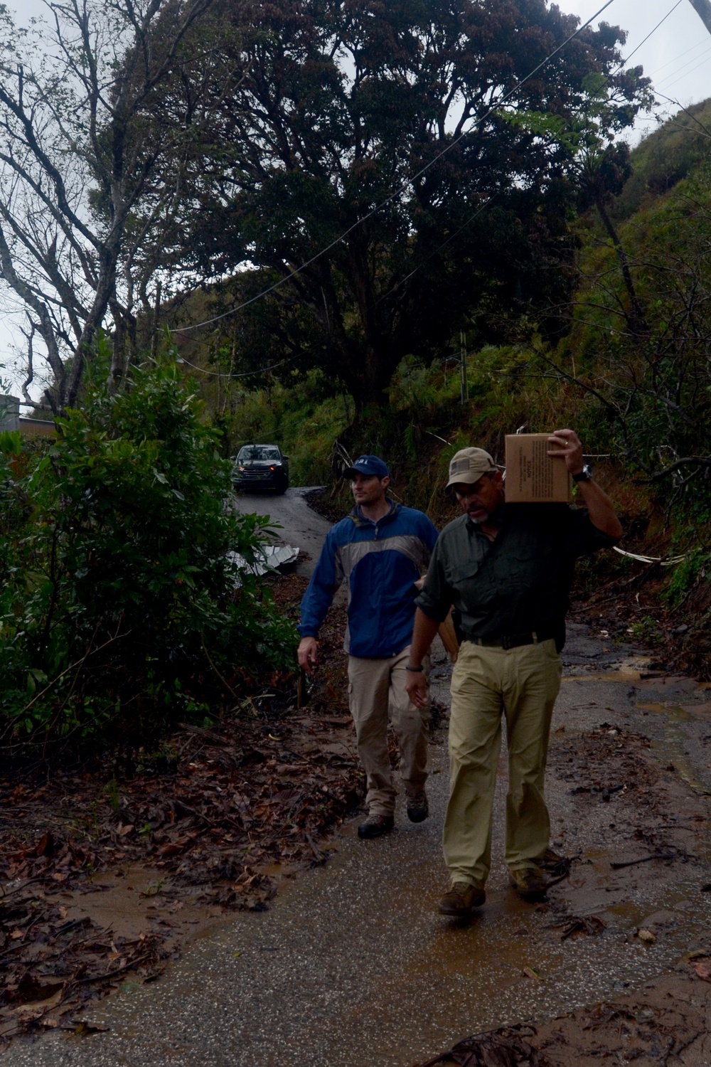 FBI, reservists deliver food, water to residents in remote areas of Adjuntas Puerto Rico
