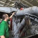 Sailors Conduct Maintenance in Nimitz Hangar Bay