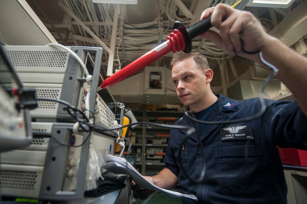 USS America Sailor calibrates electronics