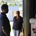 Secretary of the Puerto Rico Department of Family and responders unload infant care goods for distribution to families in need