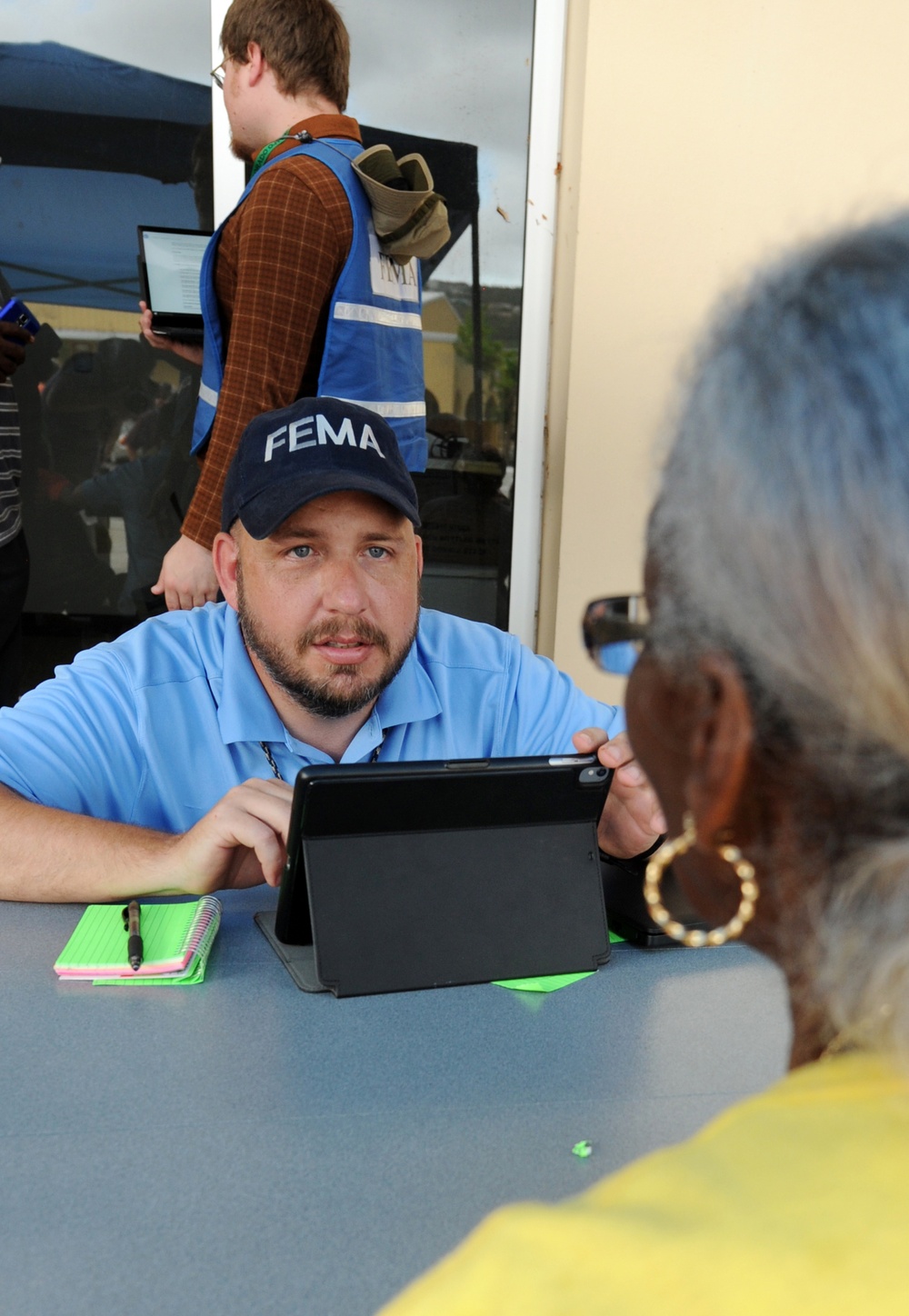 Disaster Survivor Assistance Team Members Help Register Local for FEMA Assistance
