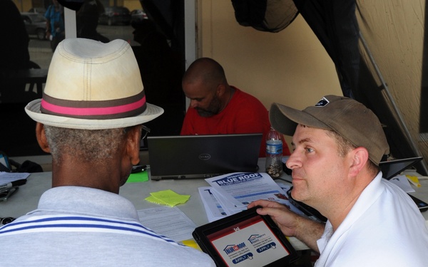 Disaster Survivor Assistance Team Members Help Register Local for FEMA Assistance