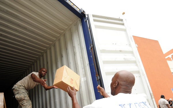 Volunteers and US Virgin Island National Guard Help to Distribute Supplies at a Point of Distribution in St. Thomas