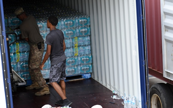 Volunteers and US Virgin Island National Guard Help to Distribute Supplies at a Point of Distribution in St. Thomas