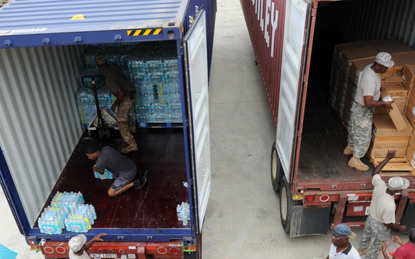 Volunteers and US Virgin Island National Guard Help to Distribute Supplies at a Point of Distribution in St. Thomas