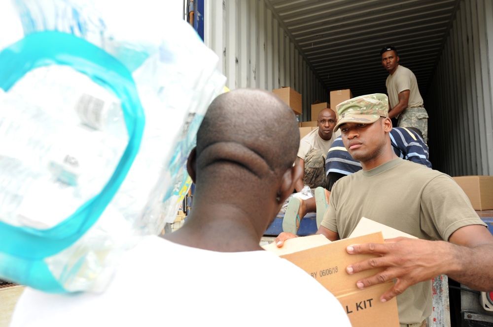 Volunteers and US Virgin Island National Guard Help to Distribute Supplies at a Point of Distribution in St. Thomas