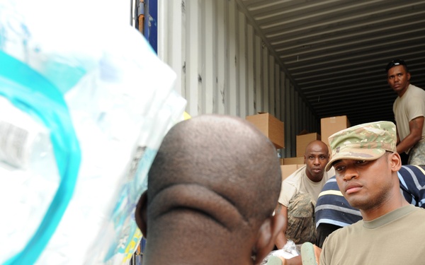 Volunteers and US Virgin Island National Guard Help to Distribute Supplies at a Point of Distribution in St. Thomas