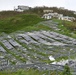 A Field of Damaged Solar Panels Remain in St. Thomas