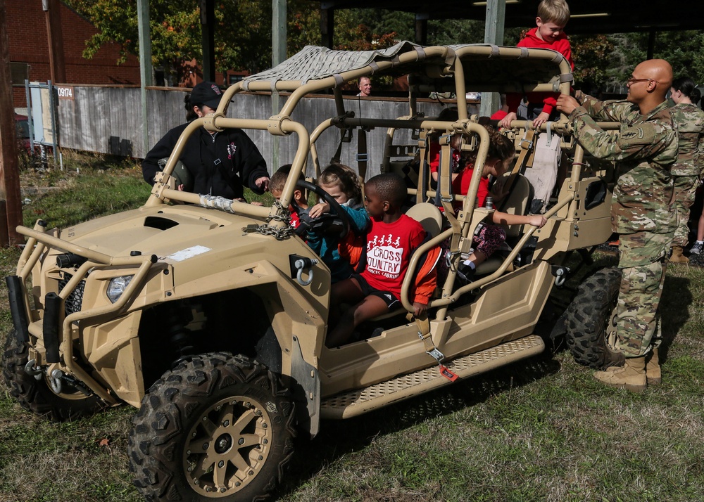 Soldiers from 1st SFG (A) reach out to Local Cross Country Team