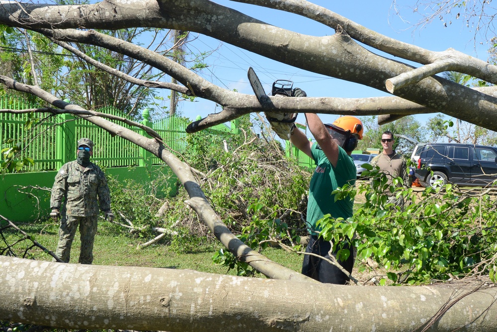 Coast Guardsmen help clean up orphanage in Aguadilla, Puerto Rico, after Hurricane Maria