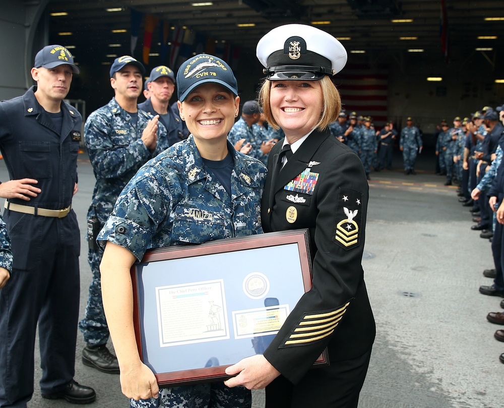 Senior Chief Hospital Corpsman Natalie Jianuzzi gets piped ashore