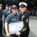 Senior Chief Hospital Corpsman Natalie Jianuzzi gets piped ashore