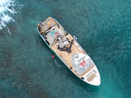 Responders work to lighter fuel from grounded Pacific Paradise