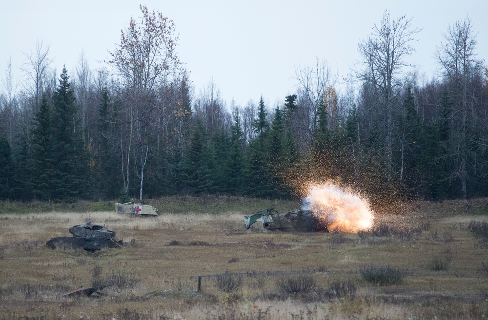 Muleskinners send 84 mm high-explosive anti-tank rockets down range at JBER