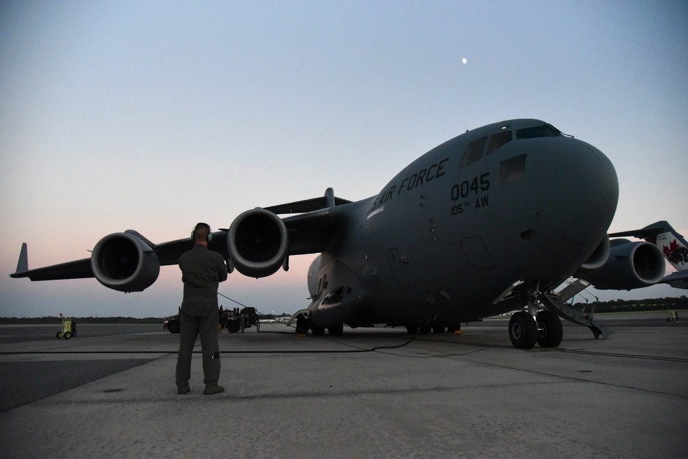 105th Airlift Wing transports 142nd Fighter Wing Airmen for hurricane relief