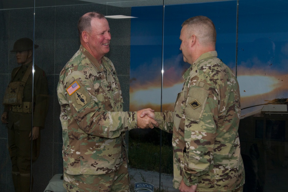 Soldier Congratulates Other for Promotion