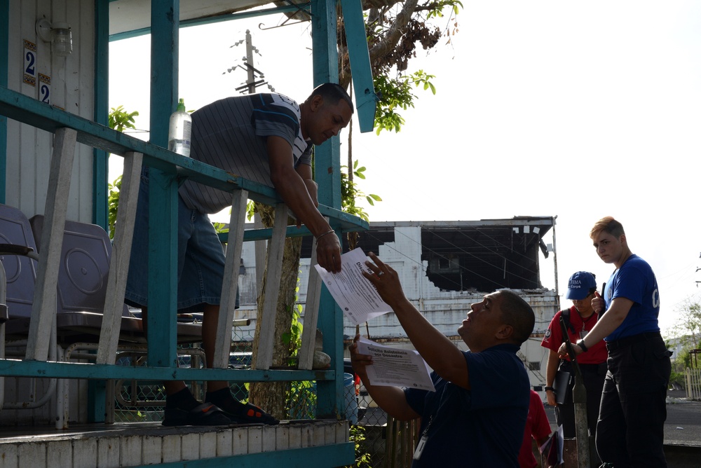 Handing out Information to Survivors