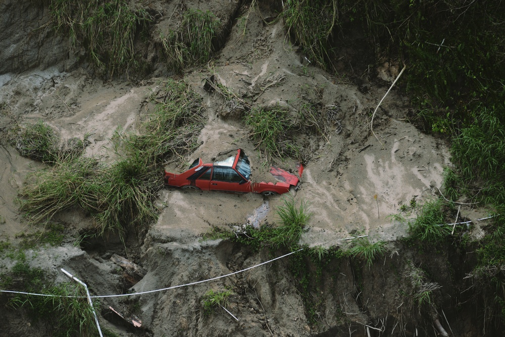 Car Engulfed in Mudslide