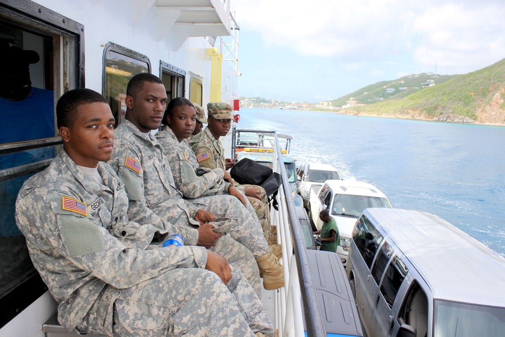 National Guard members travel by barge daily to aid people in need