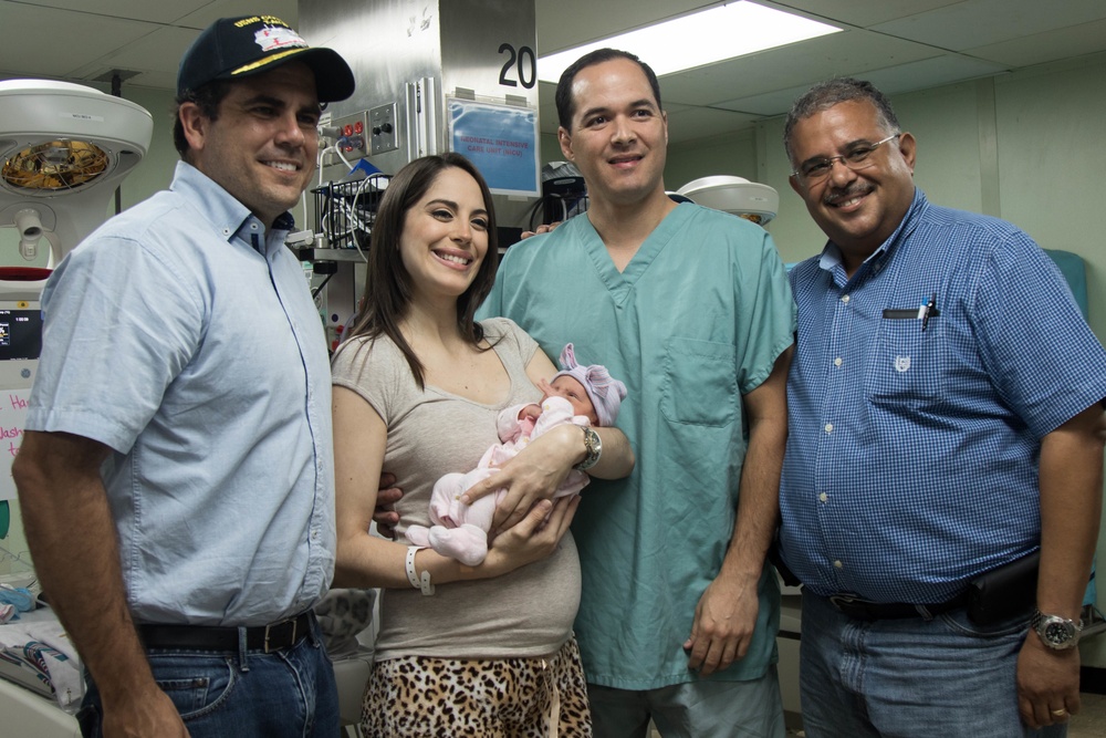 Governor visits newborn baby in USNS Comfort