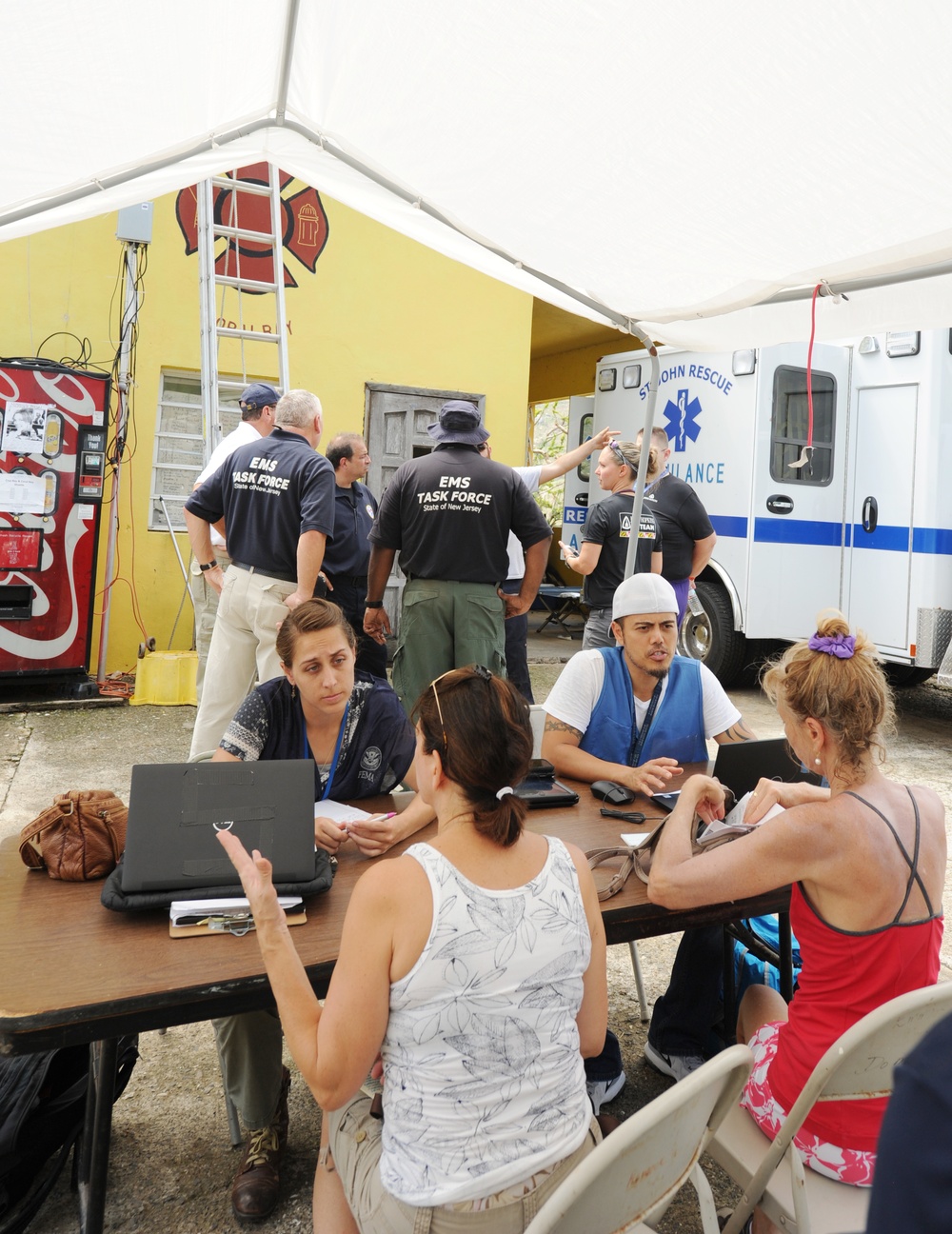 Disaster Recovery Assistance Specialists Help Register Local Residents