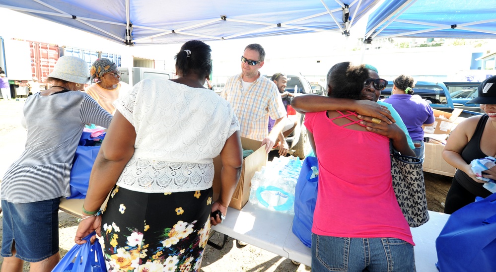 Local Residents Get Supplies at a Point of Distribution in Cruz Bay