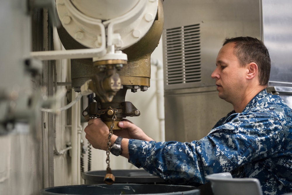 Sailor Conducts Sprinkler Testing