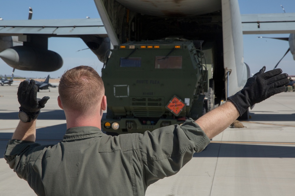 WTI Marines Load A HIMARS Into A KC-130J