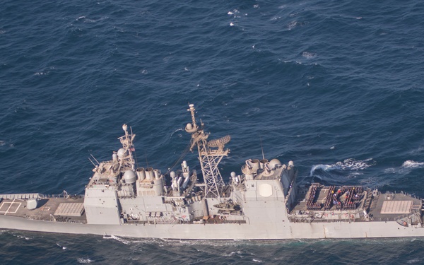 USS Lake Erie (CG 70) Sailors celebrate the Navy's birthay.