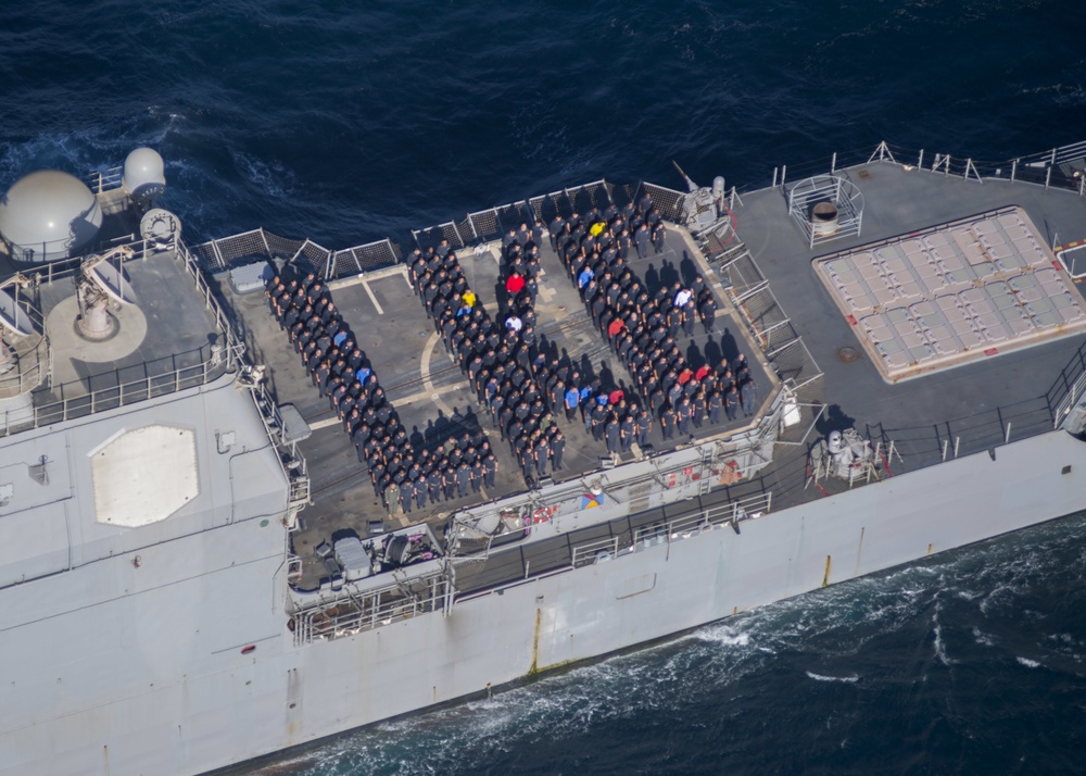 USS Lake Erie (CG 70) Sailors celebrate the Navy's birthay.