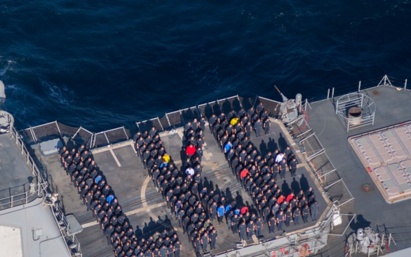 USS Lake Erie (CG 70) Sailors celebrate the Navy's birthay.
