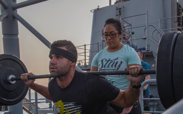 USS Lake Erie (CG 70) Sailor works out