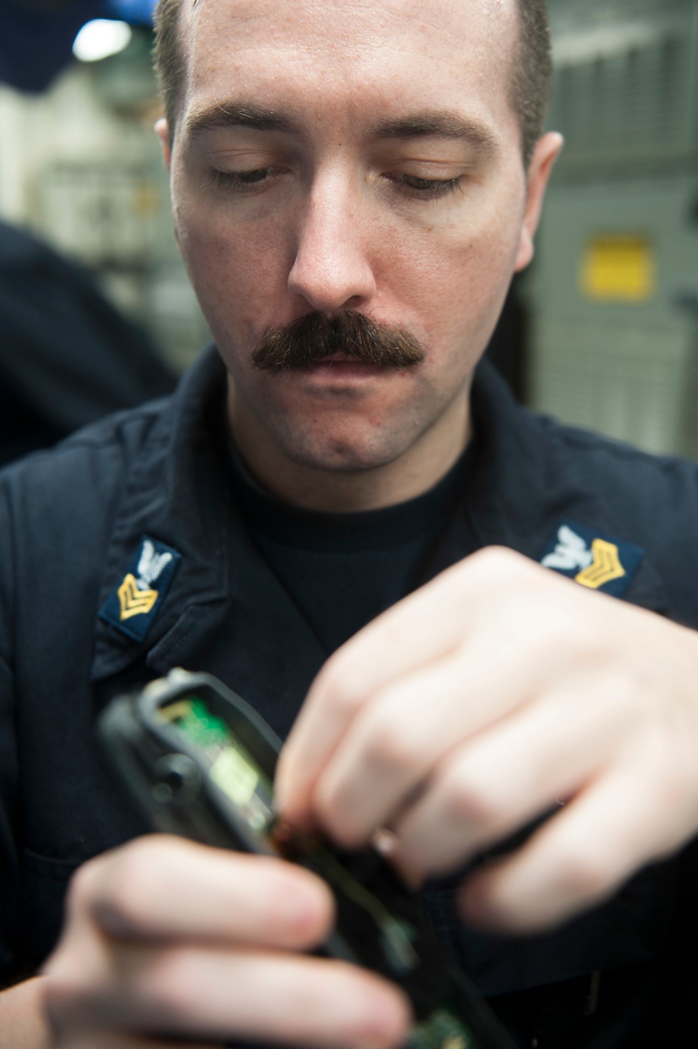 USS America Sailor assembles phone