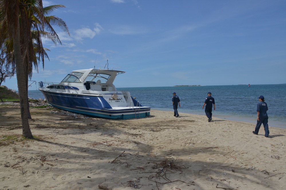 Maria ESF-10 PR Unified Command responders evaluate damaged vessels in Puerto Rico
