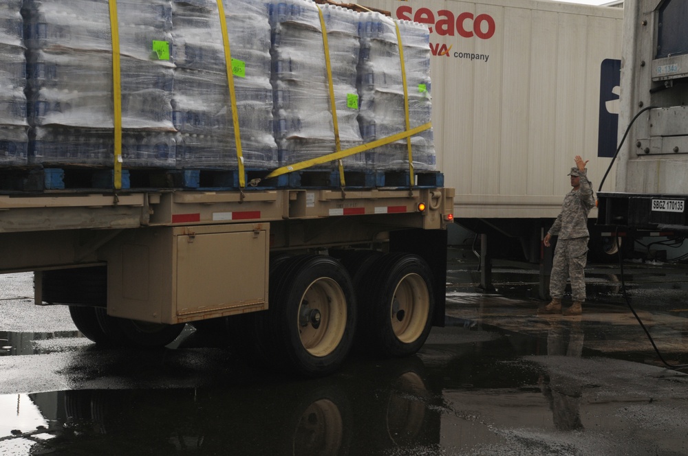 Army reservists transport water donated by Mexico