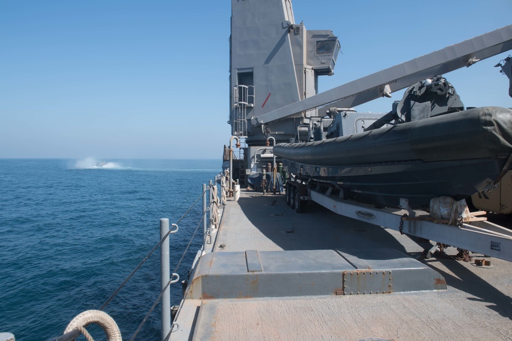 USS Pearl Harbor flight deck personnel launch and recover Army helicopters