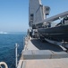 USS Pearl Harbor flight deck personnel launch and recover Army helicopters