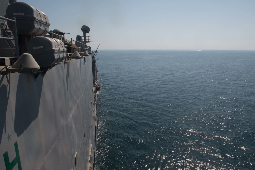 USS Pearl Harbor flight deck personnel launch and recover Army helicopters