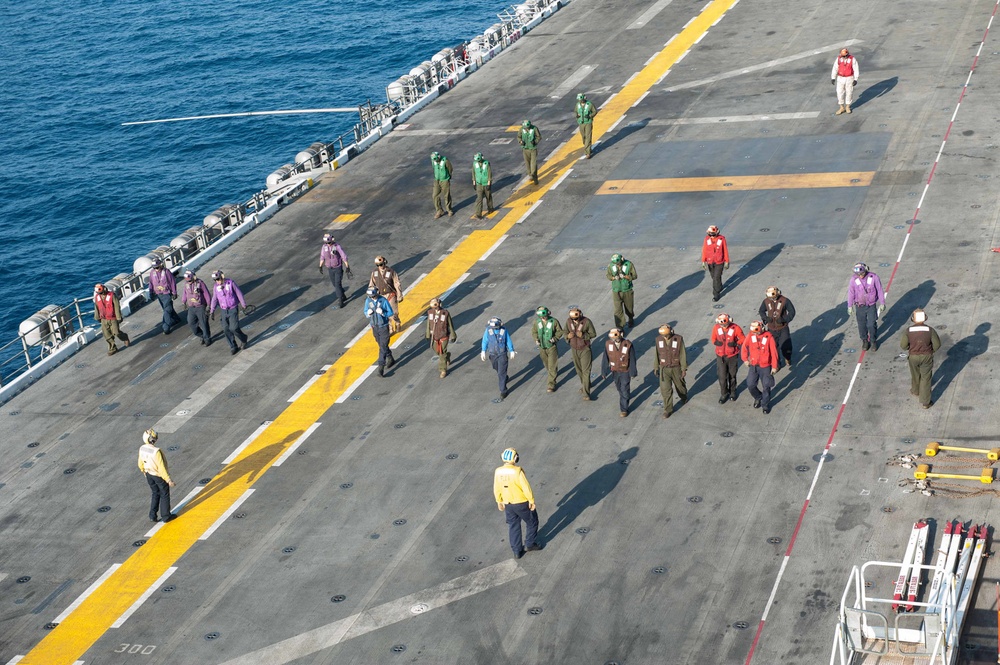 USS America crew conduct FOD walkdown