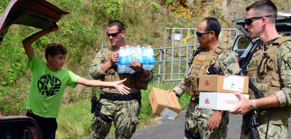Coast Guard port security units deliver food, water from FEMA to Isabela, Puerto Rico